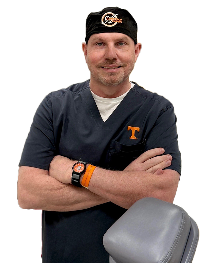 Dr. Anderson with arms crossed